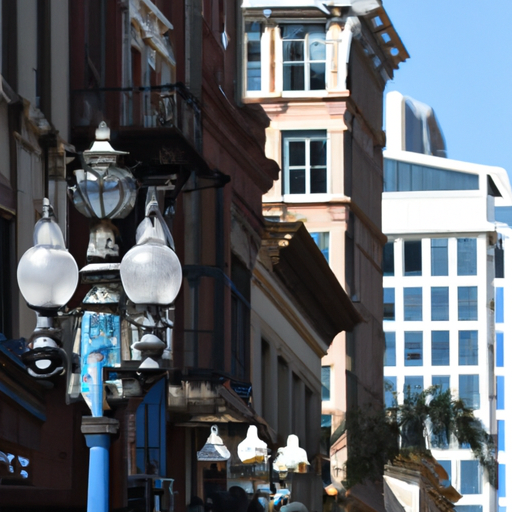 נוף רחוב הומה של רובע מנורות הגז עם פנסי הרחוב האיקוניים והמבנים ההיסטוריים שלו.